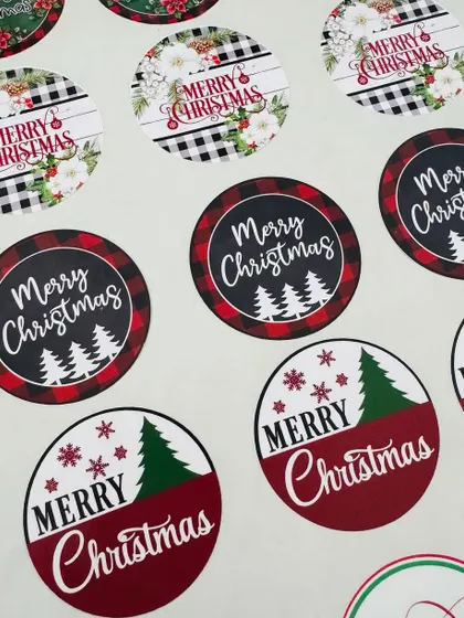 A sheet of our assorted round Christmas stickers. These are great for sealing envelopes, decorating packages, or for any holiday craft project.