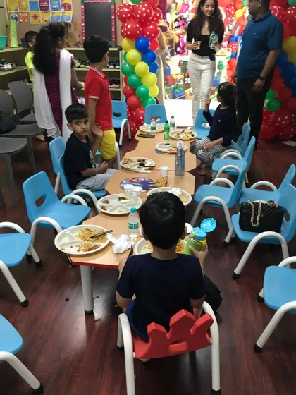 A view of the kids' dining area during Krishav's party. The children have their own space to sit together and enjoy the birthday feast.