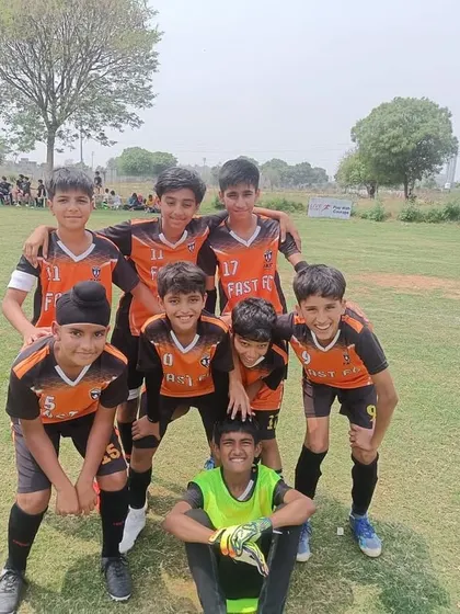 The U11 runners-up team posing for a photo after the Junior League tournament.