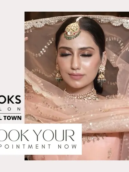 A serene portrait of our bride, with her eyes gently closed to showcase the delicate eyeshadow work. This image highlights the artistry and precision we bring to every bridal makeup application.
