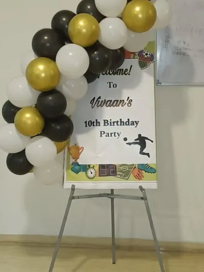 A personalized welcome sign is a great way to greet guests. This one was created for a football-themed 10th birthday party.