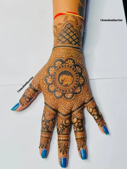 Another angle of the elephant mehandi, highlighting the clean lines and the beautiful symmetry of the floral mandala.