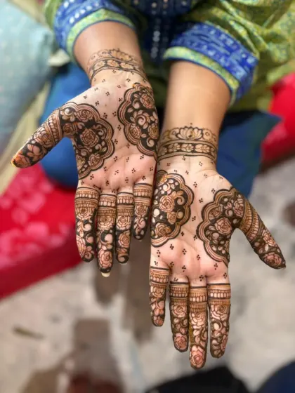 A stunning floral cutwork design done for a client during a Karwachauth group booking.