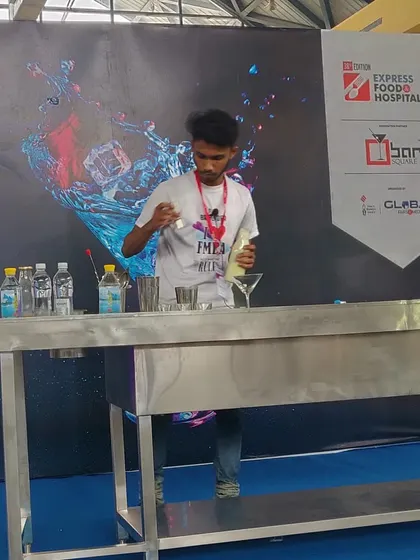 A competitor in action during a mixology competition we supported. The focus and precision required under pressure is immense.