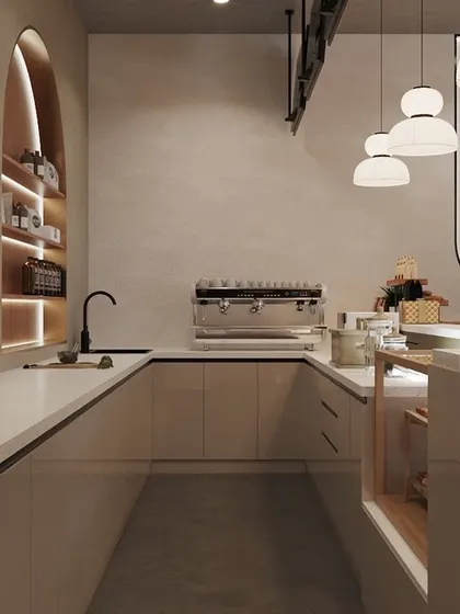 Behind the counter, we designed a clean and organized workspace. The bright, even lighting and ample counter space are crucial for staff efficiency, proving that great design considers both customer experience and operational needs.