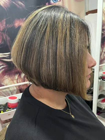 Another angle of the perfected inverted bob, which now complements her highlights beautifully.