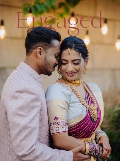 A warm, intimate portrait of a newly engaged couple under soft lighting. We aim to create a comfortable atmosphere where you can share these quiet moments together, even during a bustling event.
