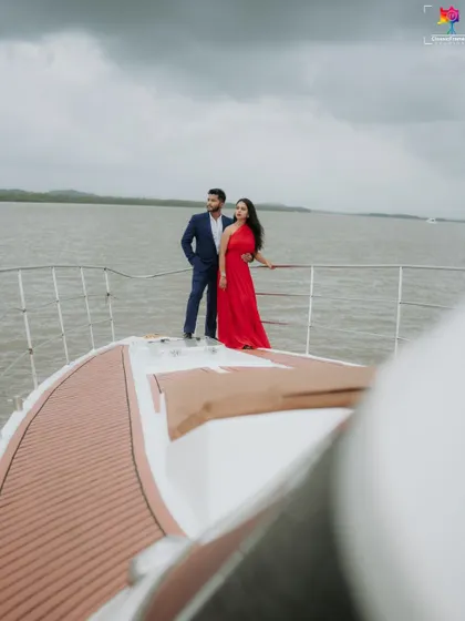 A wide-angle shot from the bow of the yacht, emphasizing the vastness of the water and the feeling of a shared adventure ahead.