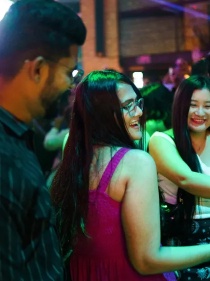Smiles and laughter are the best feedback. Capturing a moment of pure happiness from the crowd as they dance the night away.