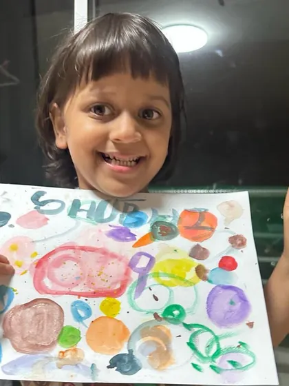 A duplicate of ID 134, this student's bright smile and peace sign show how much fun she had in our online class.