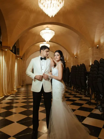 A beautiful couple portrait, where the bride's soft, wavy hair adds a touch of romance.