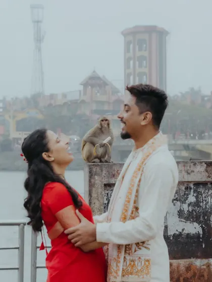 A fun, unscripted moment from a Haridwar pre-wedding shoot, where a monkey photobombed the couple, leading to genuine laughter.