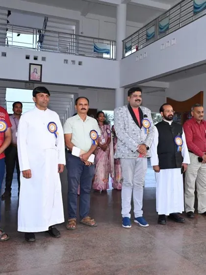 Standing with the other guests and faculty at the CMI Public School annual day in Gundlupete. It was a wonderful event with talented students.