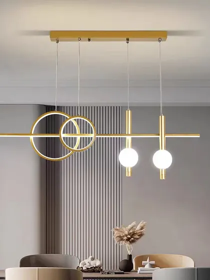A linear pendant with a mix of geometric shapes, including rings and globes. This fixture is a playful yet sophisticated choice for a modern dining area.