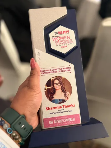 A closer look at the award for Fashion & Lifestyle Woman Entrepreneur of the Year. This is a testament to our team's unwavering dedication to excellence.