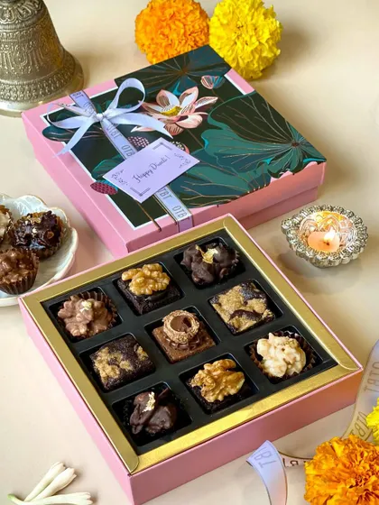 Here is the 9-piece version of my Diwali mini brownie box. It’s a slightly smaller but equally luxurious option for gifting, filled with an assortment of my best eggless brownie flavors.