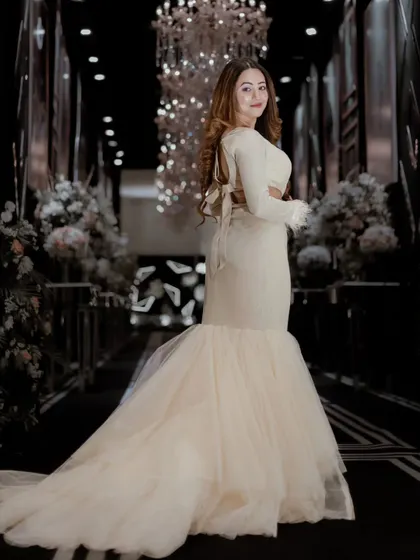 This fairy-like white gown was a dream to wear. The mermaid cut and tulle train made me feel like I was in a fairytale.
