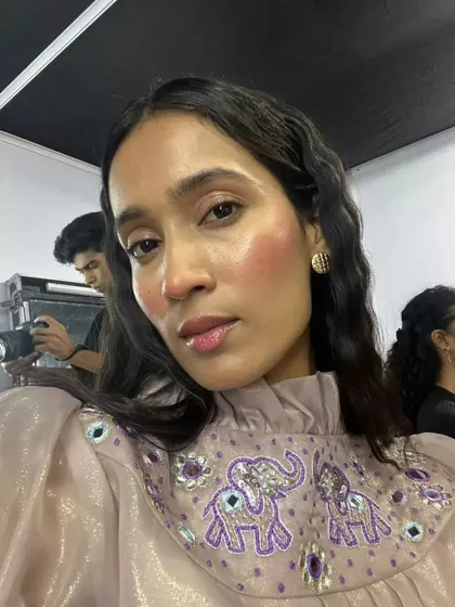 Another angle of the dewy, flushed look from the FAD show. You can see the beautiful sheen on the high points of the face.