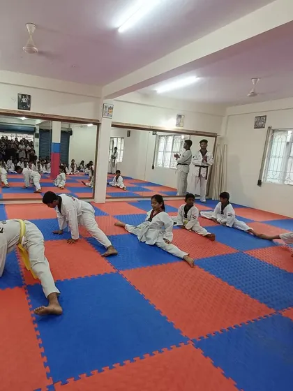 Another angle of our students dedicated to their flexibility training.