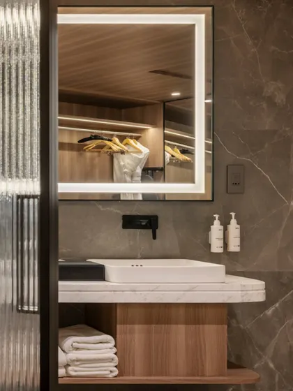 Additional views of the Radisson Resort, Khopoli, showcasing various interior and exterior details, from lobby seating areas and restaurant layouts to guest room configurations and architectural elements.