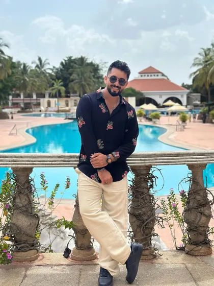 A full-body shot showing a relaxed but put-together look for a daytime event.
