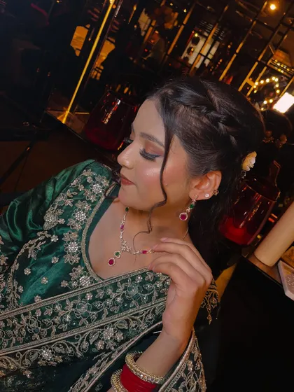 A close-up of the party makeup, showing the subtle winged eyeliner and soft blush. The look is polished and pretty, perfect for someone who wants to look glamorous without being over the top.