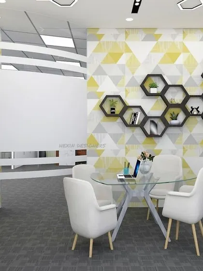 A design for a small meeting or discussion area. The geometric wallpaper, hexagonal shelving, and glass-top table create a stylish and contemporary feel, perfect for creative brainstorming.