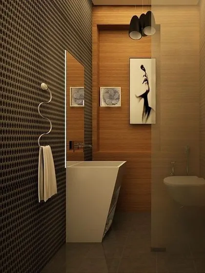 A compact powder room with textured walls, wood accents, and artistic decor, showing how even small spaces can be highly stylized.