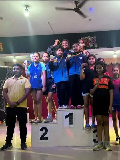 The victorious U-14 Girls Team, including Ayushi Singhal, Samriddhi Sharma, and Akanksha, celebrating their Gold Medal win at the CBSE Cluster XIX Tournament. Their teamwork was flawless.