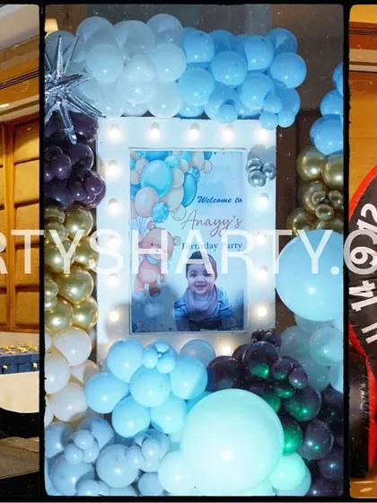 A collage showing different elements of a teddy bear party, including a large 3D teddy prop, a welcome sign, and an inflatable dart game for entertainment.