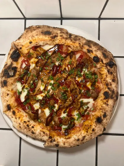 Our special Adobo Chicken pizza is calling out to you on this rainy day. It's pure comfort.