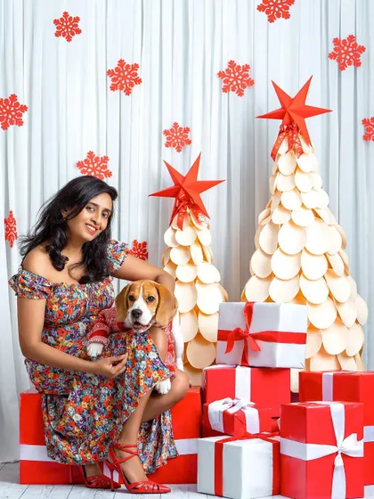 A beautiful portrait from our Christmas mini-sessions. This woman and her sweet beagle, both dressed for the occasion, create a lovely holiday memory.