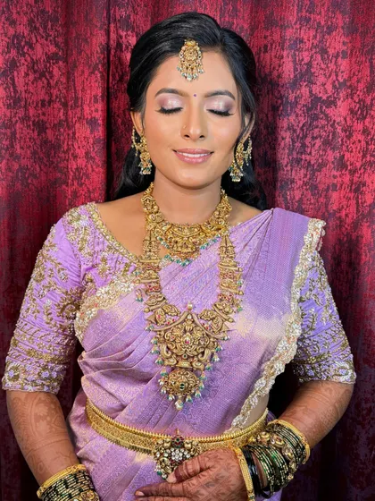 A close-up of the eye makeup for the lavender saree look. The colors are soft and blended, creating a romantic and elegant feel.