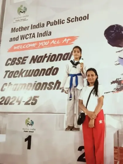 On the podium with her mother. Family support is a huge part of a player's success.