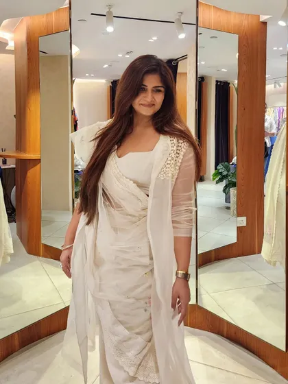 This Rakhi look redefines festive wear. I've paired linen wide-leg trousers and a crop top with a sheer organza trench and a crochet-edged dupatta for a chic, comfortable, and modern Indo-Western outfit.