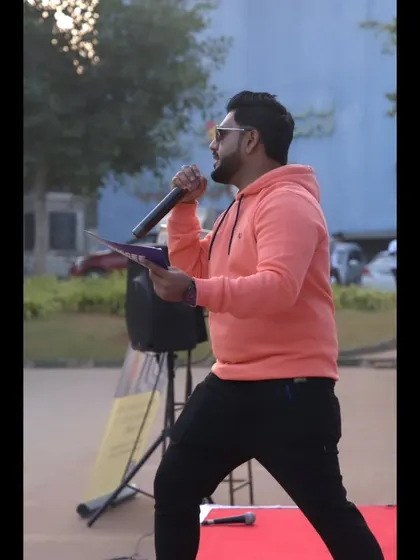 A side profile shot while hosting the CRY walkathon, showing my focus and engagement.