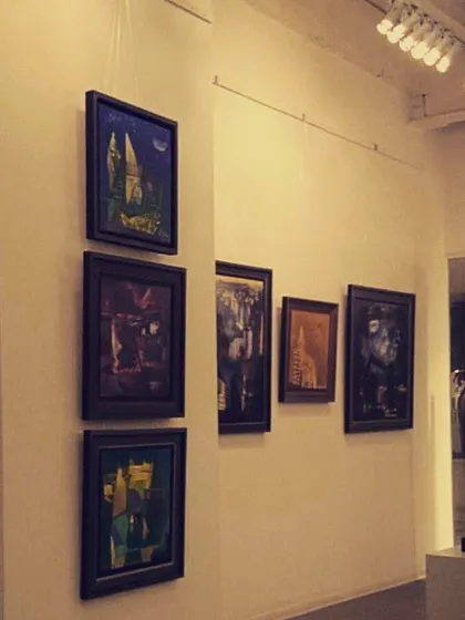 A view of the Somenath Maity solo exhibition, titled "Structures," at our Leela Palace gallery. The show focused on architectural themes, with moody, atmospheric paintings that filled the space.