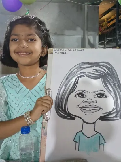 A young girl with a big smile at a birthday party in Magarpatta City, Pune.