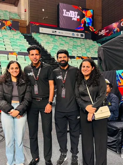Posing with fellow officials and friends at an INBL event. The basketball community is tight-knit, and it's the people who make the game so special.