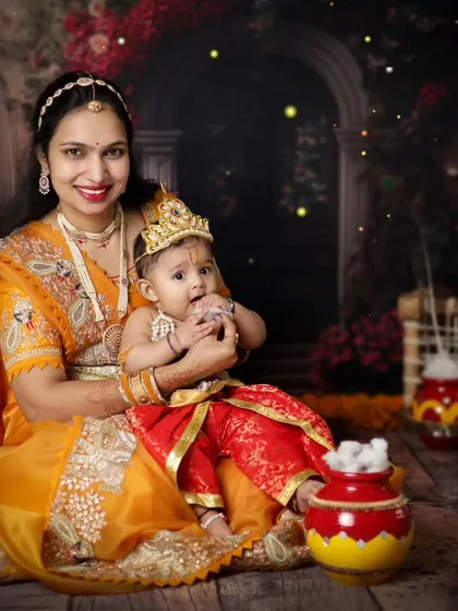 A mother and her little Krishna, a timeless portrait of love. These are the memories that become family heirlooms.