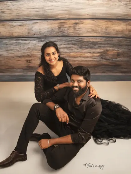 A lovely portrait of the new parents. This photo captures the couple's joy and connection after welcoming their newborn, taken during the same session as their full family portraits.