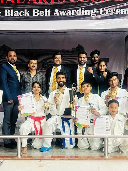 Our winning team proudly displays their medals and trophy at the YMCI championship.