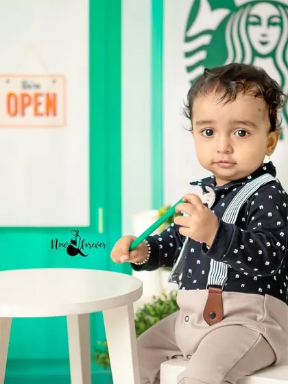 A thoughtful moment for our little coffee connoisseur. The detailed set, complete with tiny cups and bags, makes the scene come alive.