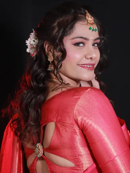 A unique South Indian look created by one of my students. This shows their ability to create advanced and creative styles.