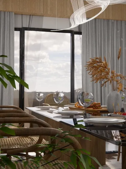 A view from the dining table towards the large window, showing how we connect indoor spaces with the outdoors.