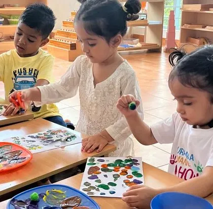 Children explore colors and textures through painting during our Holi celebration. Art is a wonderful way to engage with the spirit of a festival.