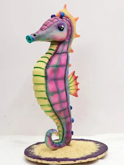 It's never too late to learn a new skill. This sculpted seahorse cake was made by a 56-year-old student in my structured cakes class, proving that with the right guidance, anyone can create something amazing.
