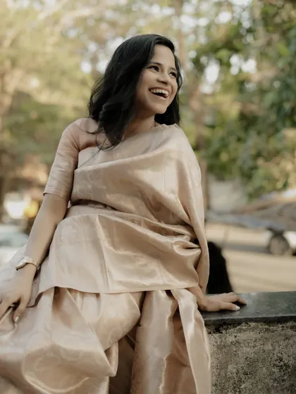 A moment of pure, uninhibited laughter. This candid shot captures the subject's joyful spirit.