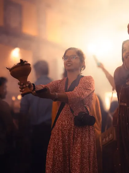 As a photographer, I often find myself torn between living in the moment and capturing it. Here I am, trying to do both during the mesmerizing Durga Puja celebrations.