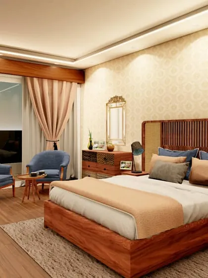 This bedroom design for a Gurugram apartment showcases our expertise in bespoke rattan and cane furniture. The warm wood tones of the bed frame and side tables are paired with soft, neutral fabrics and a classic wallpaper pattern, creating a timeless and soothing atmosphere.